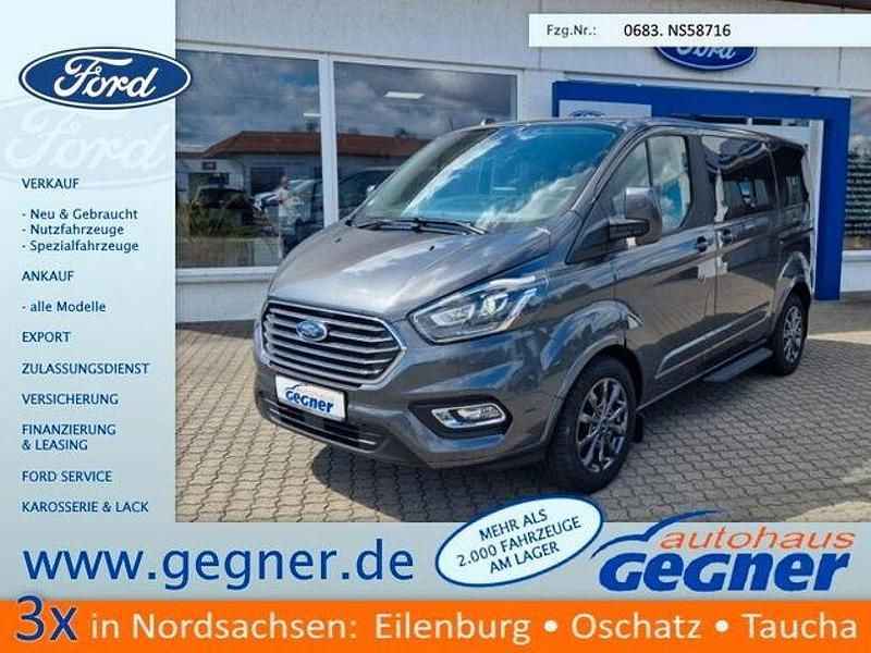 Grau Gebraucht 2022 Ford Tourneo Custom Titanium X Van / Kleinbus | 42.840 € (Fairer Preis) - Bild 1/4