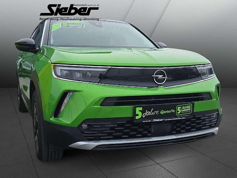 Gebraucht Opel Mokka-e Elegance 100 kW (136 PS) 2022 Matcha green/ikone gruen SUV