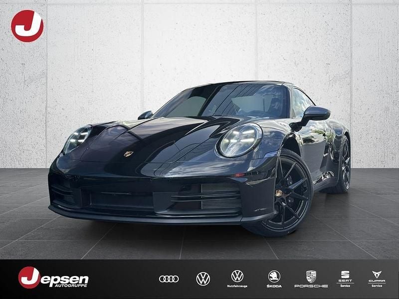 Tiefschwarzmetallic Gebraucht 2025 Porsche 911 Carrera Coupé | 142.900 € (Superpreis) - Bild 1/4