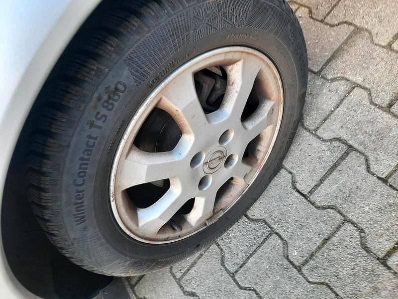 Second-hand Opel Astra 84 CP (61 kW) 2009 Argintiu Coupe