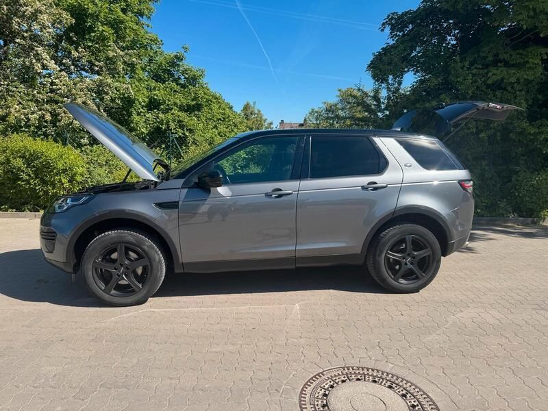 Grau Gebraucht 2019 Land Rover Discovery 5 SUV | 22.222 € - Bild 1/4