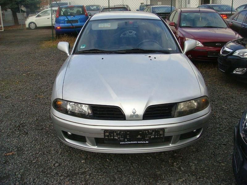 Grau Gebraucht 2003 Mitsubishi Carisma Comfort Edition Limousine | 950 € - Bild 1/4