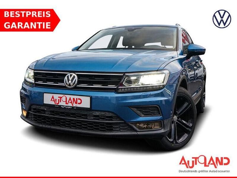 Blau Gebraucht 2017 VW Tiguan SUV | 21.890 € (Etwas zu teuer) - Bild 1/4