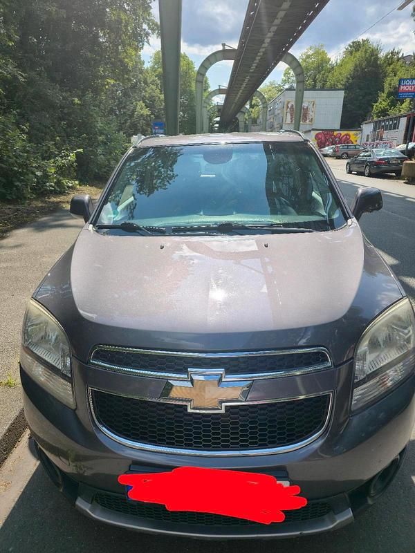Grau Gebraucht 2012 Chevrolet Orlando Van / Kleinbus | 3.300 € (Superpreis) - Bild 1/4