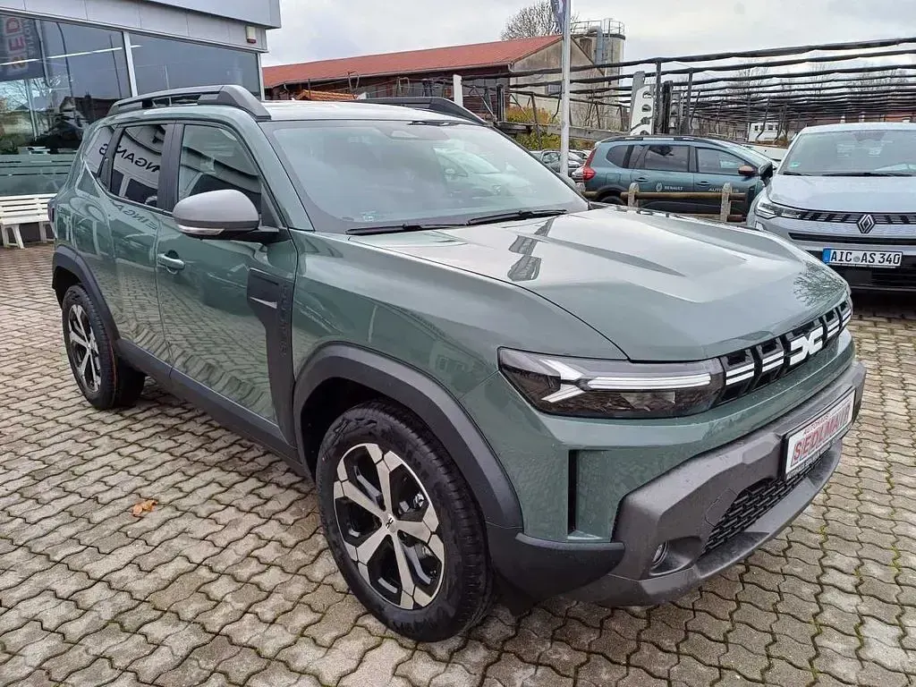 Neu Dacia Duster Journey 101 PS (74 kW) 2025 Zederngrün SUV