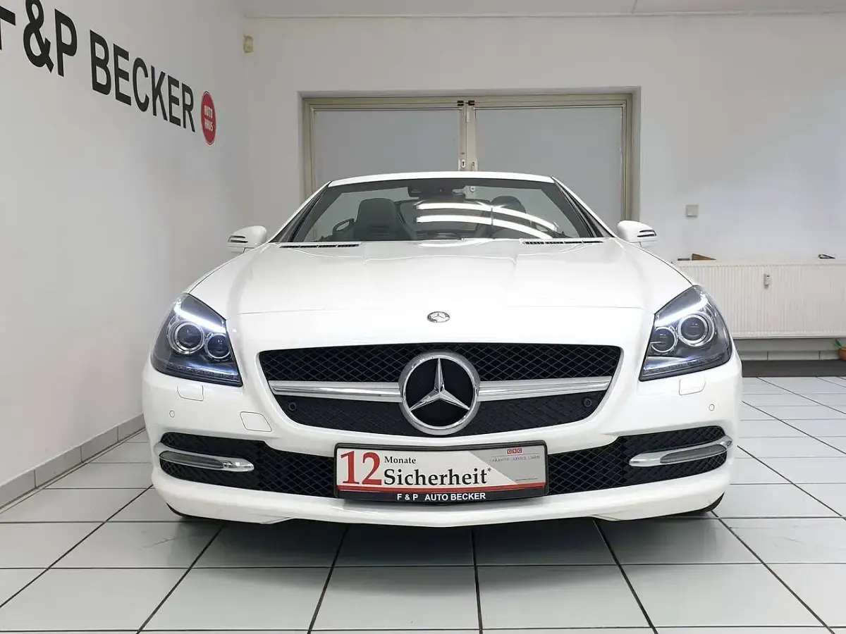 Gebraucht Mercedes SLK200 184 PS (135 kW) 2015 Polarweiss Cabrio