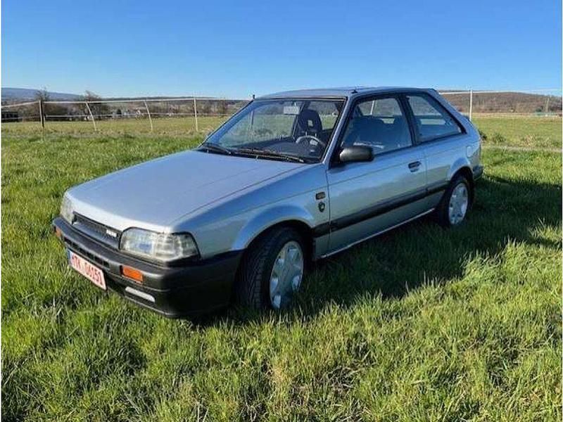 Silber Gebraucht 1988 Mazda 323 Coupé | 8.500 € - Bild 1/4
