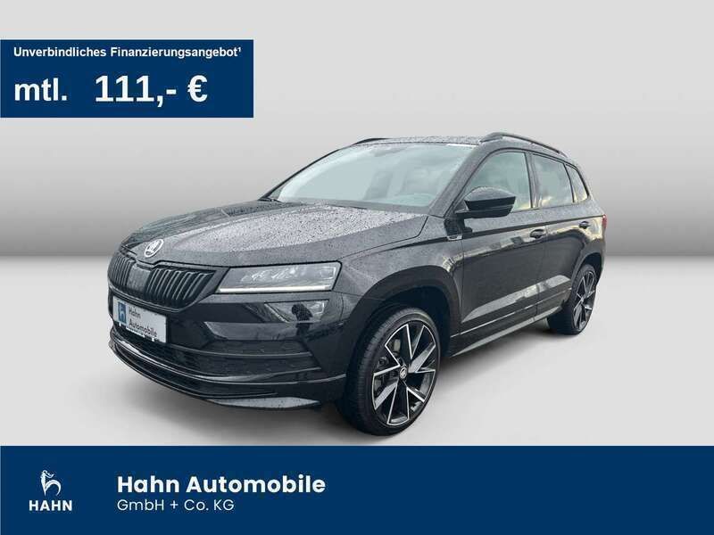 Schwarzmagic perleffekt met. Gebraucht 2021 Skoda Karoq SportLine SUV | 23.995 € (Fairer Preis) - Bild 1/3