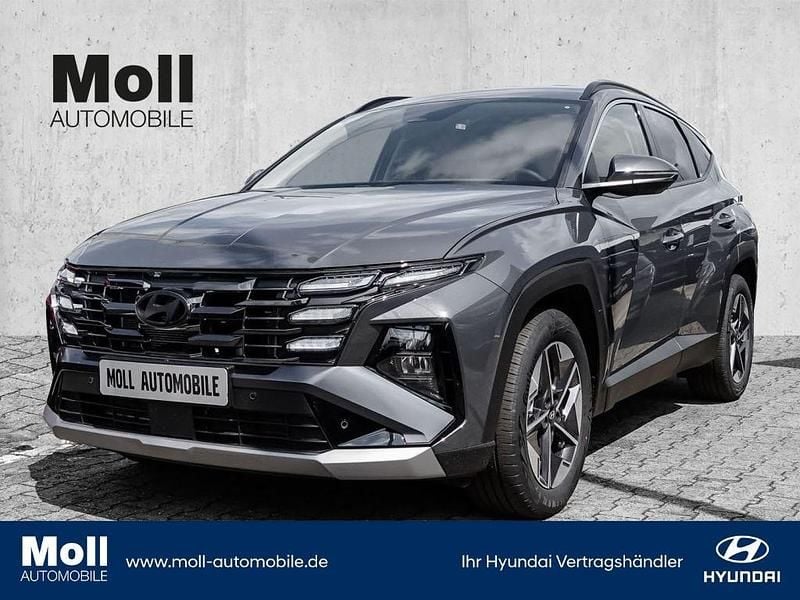 Grau Gebraucht 2024 Hyundai Tucson Trend SUV | 31.475 € (Superpreis) - Bild 1/4