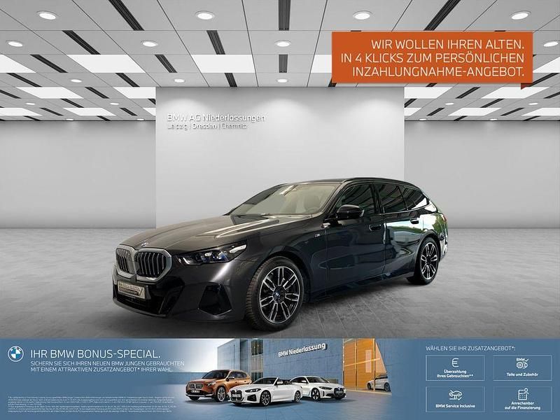 Grau Gebraucht 2024 BMW 540 Comfort Edition Kombi | 65.708 € - Bild 1/2