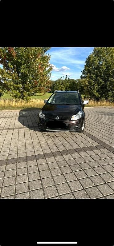 Braun Gebraucht 2013 Suzuki SX4 Kleinwagen | 6.199 € (Fairer Preis) - Bild 1/4