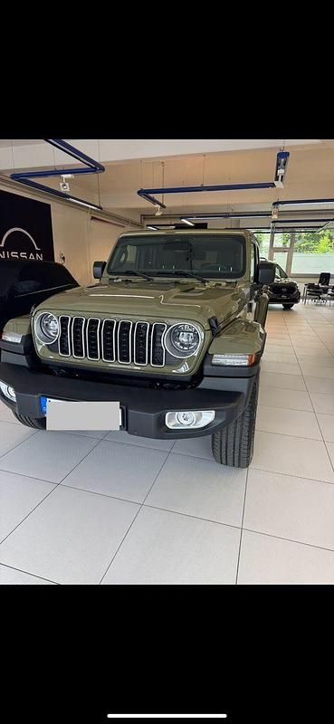 Grün Gebraucht 2025 Jeep Wrangler Sahara SUV | 69.900 € (Guter Preis) - Bild 1/4