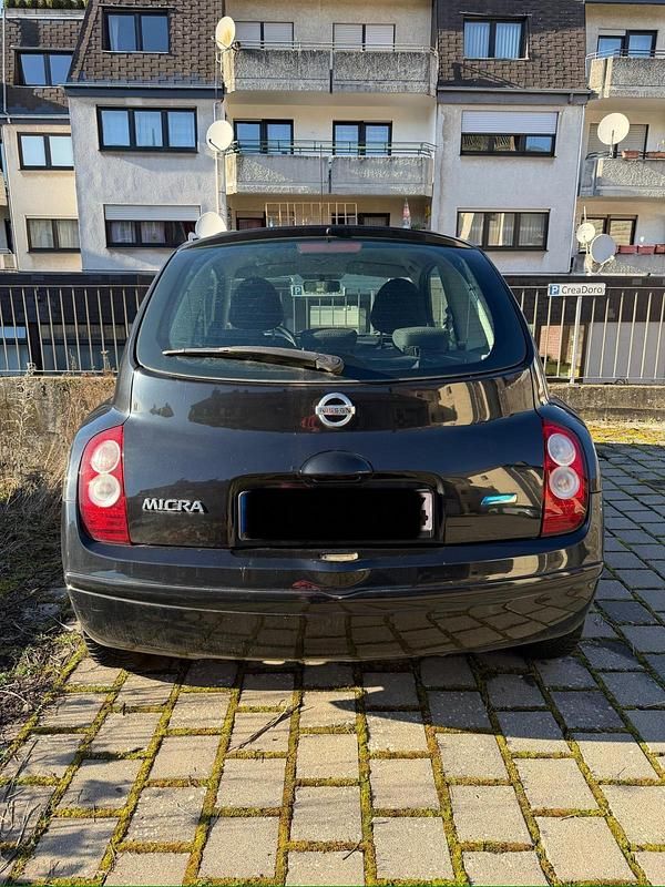 Gebraucht Nissan Micra 68 PS (50 kW) 2010 Schwarz Kleinwagen