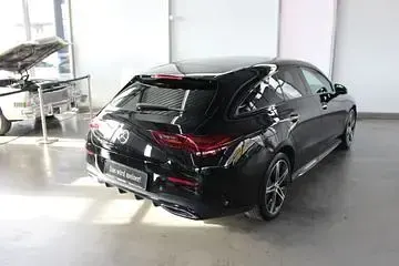 Gebraucht Mercedes CLA250 AMG Line Premium Plus 163 PS (119 kW) 2023 Metalliclack kosmosschwarz Coupé