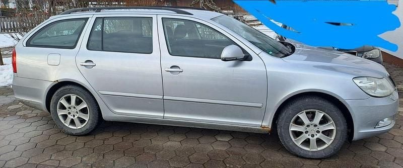 Gebraucht Skoda Octavia Ambiente 122 PS (89 kW) 2011 Grau Kombi