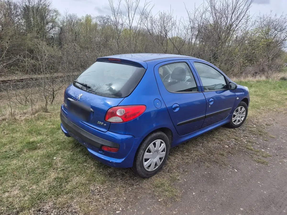 Gebraucht Peugeot 206+ 73 PS (53 kW) 2011 Blau Kleinwagen