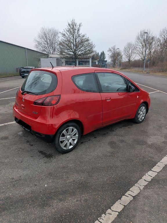 Gebraucht Mitsubishi Colt Top 95 PS (69 kW) 2011 Rot Kleinwagen
