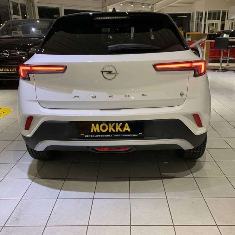 Gebraucht Opel Mokka-e Ultimate 100 kW (136 PS) 2023 Jade weiß (uni) SUV