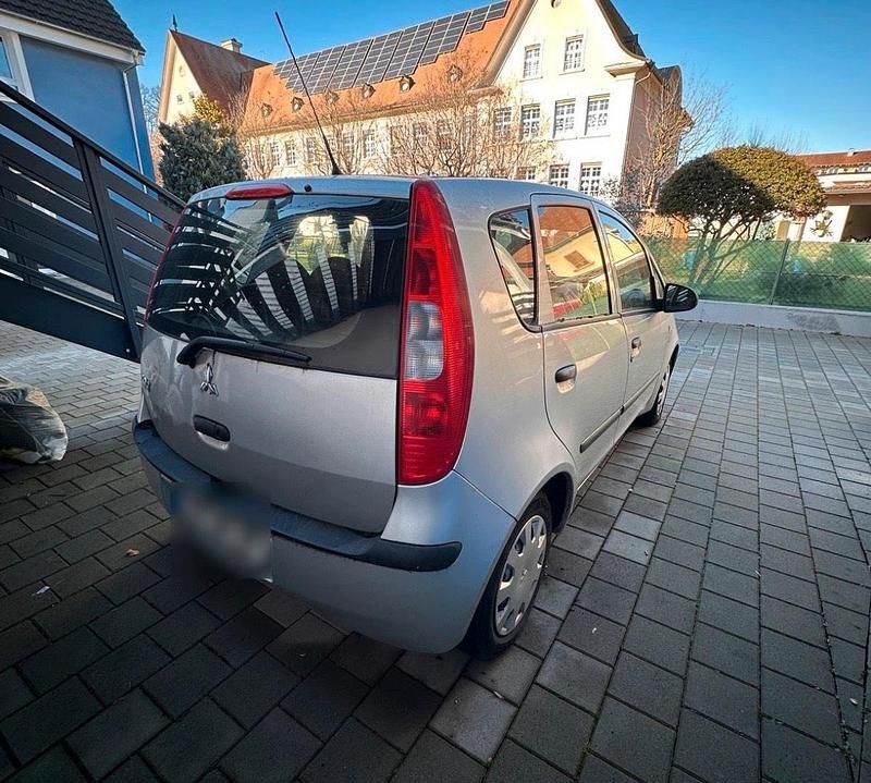 Second-hand Mitsubishi Colt 75 CP (55 kW) 2005 Gri Hatchback