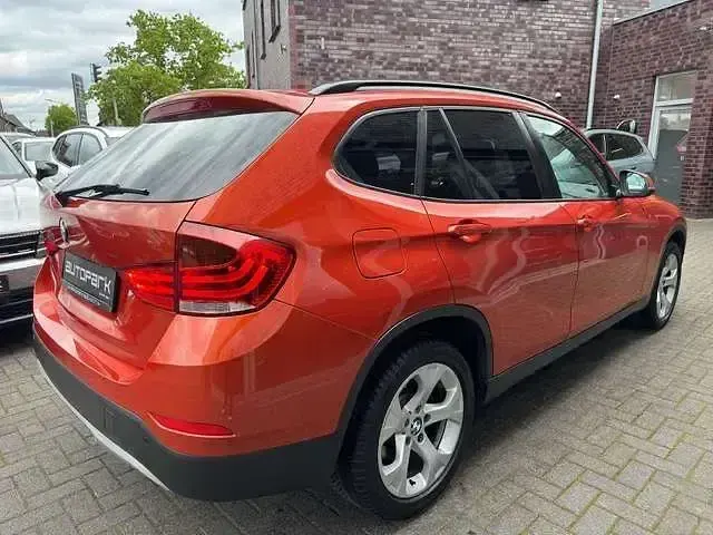 Gebraucht BMW X1 Sport Line 184 PS (135 kW) 2013 Orange SUV