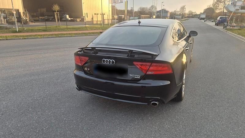 Second-hand Audi A7 245 CP (180 kW) 2013 Negru Hatchback
