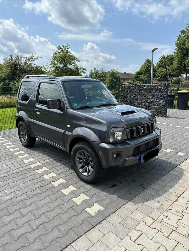 Grau Gebraucht 2015 Suzuki Jimny Ranger SUV | 15.000 € (Fairer Preis) - Bild 1/4