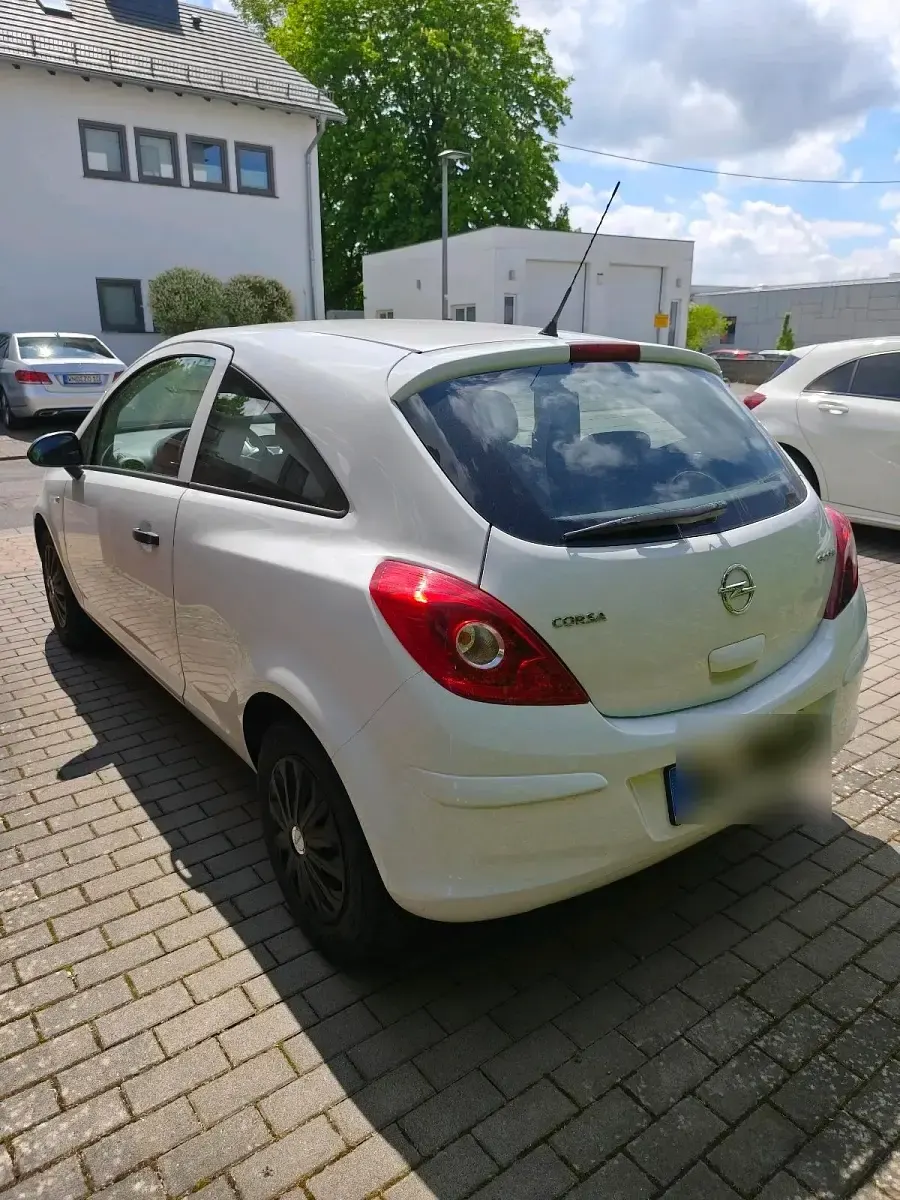 Gebraucht Opel Corsa 69 PS (50 kW) 2012 Weiß Kleinwagen