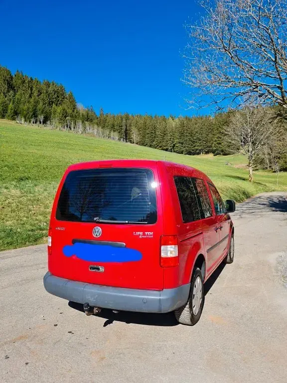 Gebraucht VW Caddy Team 105 PS (77 kW) 2010 Rot Van / Kleinbus