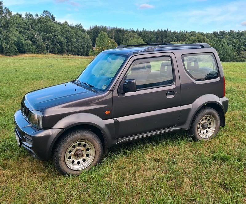 Andere außenfarben Gebraucht 2009 Suzuki Jimny SUV | 5.900 € (Superpreis) - Bild 1/4