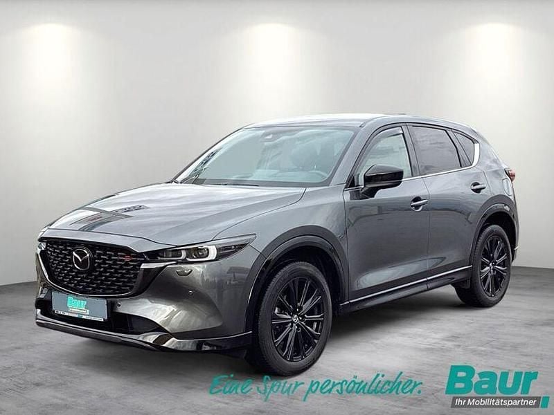 Machine grey metallic Gebraucht 2024 Mazda CX-5 Homura-Line SUV | 35.840 € (Fairer Preis) - Bild 1/4