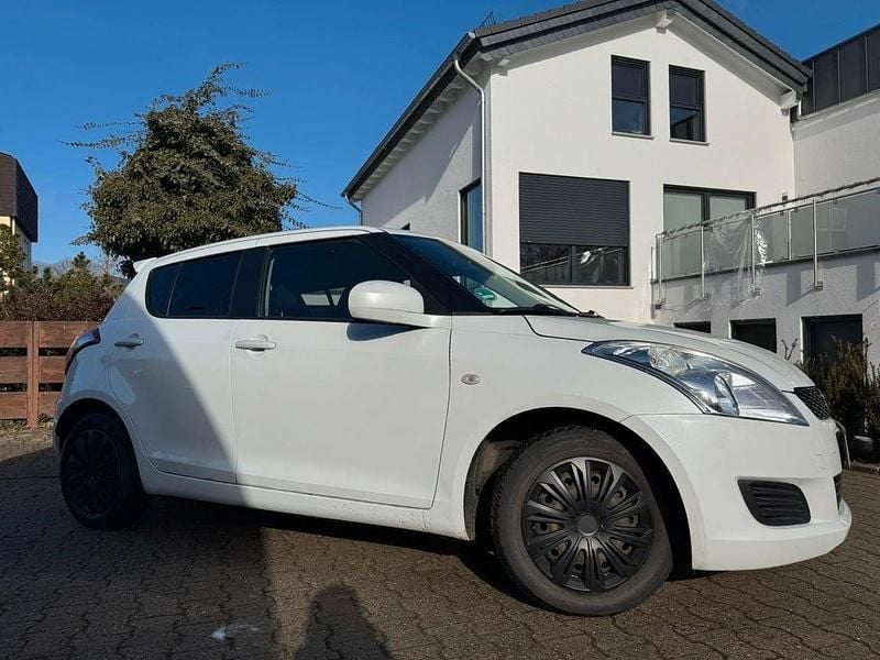 Gebraucht Suzuki Swift X-TRA 94 PS (69 kW) 2013 Weiß Kleinwagen