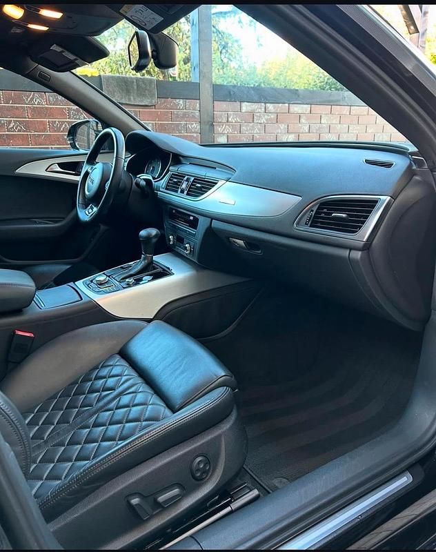 Second-hand Audi A6 Design 310 CP (228 kW) 2014 Negru Break