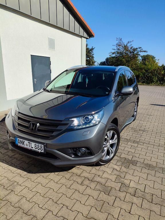 Grau Gebraucht 2015 Honda CR-V Lifestyle SUV | 12.490 € (Fairer Preis) - Bild 1/4