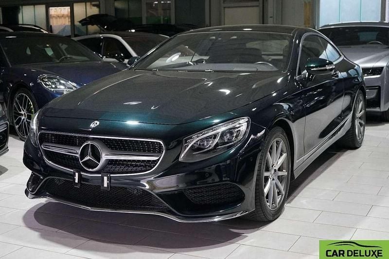 Smaragdgruen metalliclack Gebraucht 2018 Mercedes 450 AMG Coupé | 45.888 € - Bild 1/4