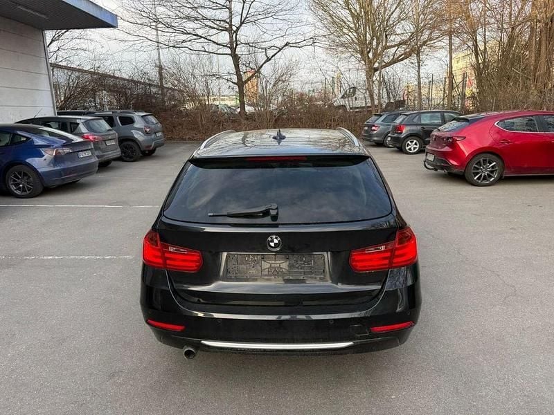 Gebraucht BMW 320 184 PS (135 kW) 2012 Schwarz Kombi