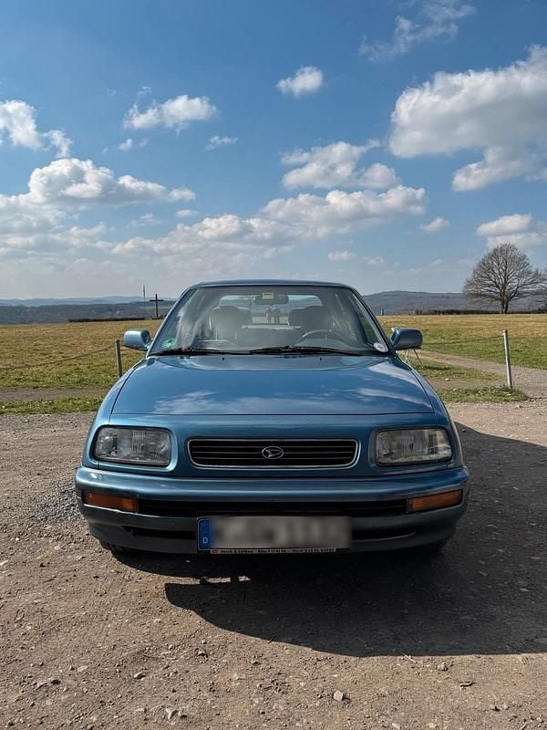 Blau Gebraucht 1995 Daihatsu Applause Limousine | 1.499 € - Bild 1/4