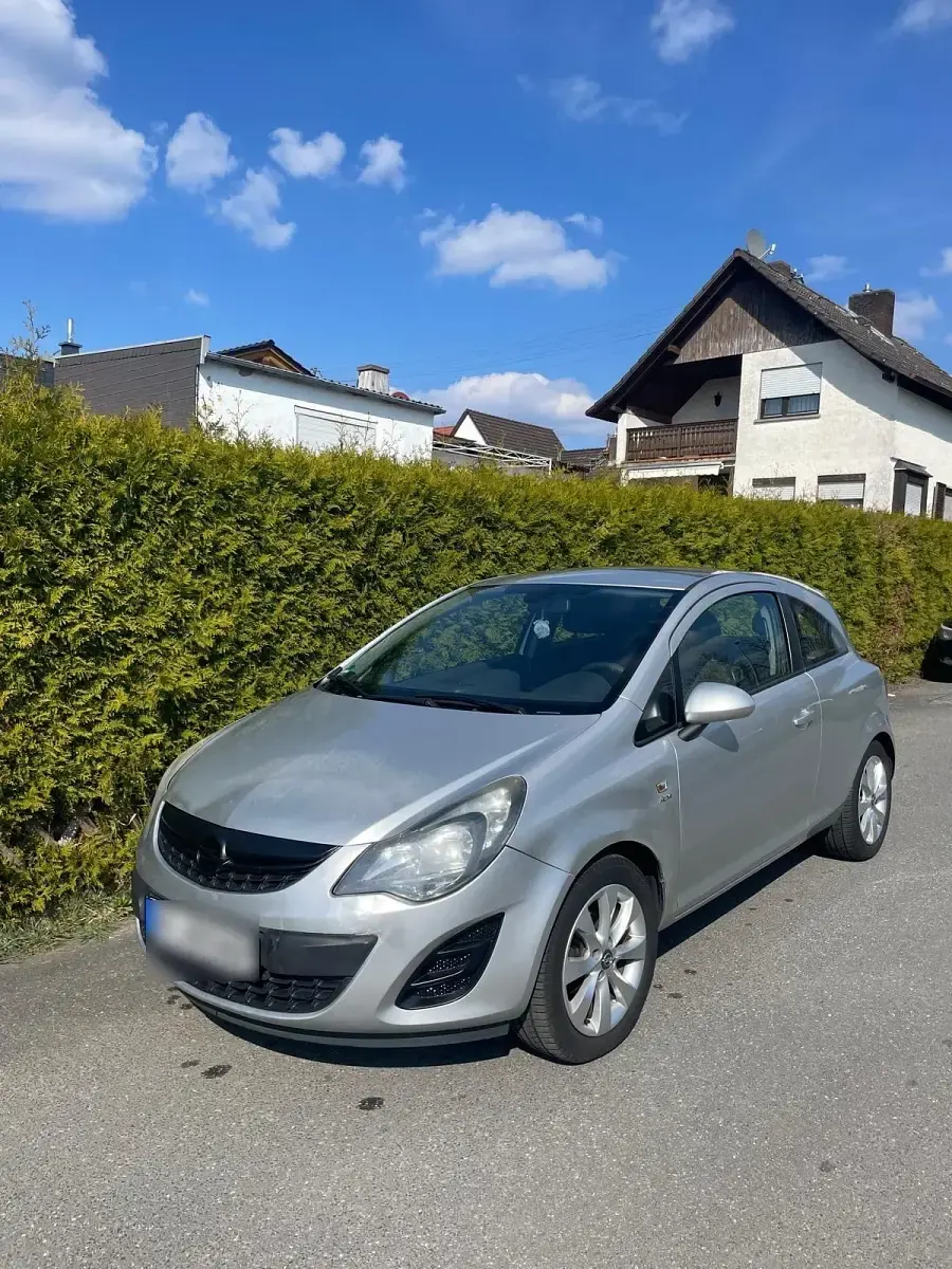 Second-hand Opel Corsa 87 CP (63 kW) 2013 Argintiu Hatchback