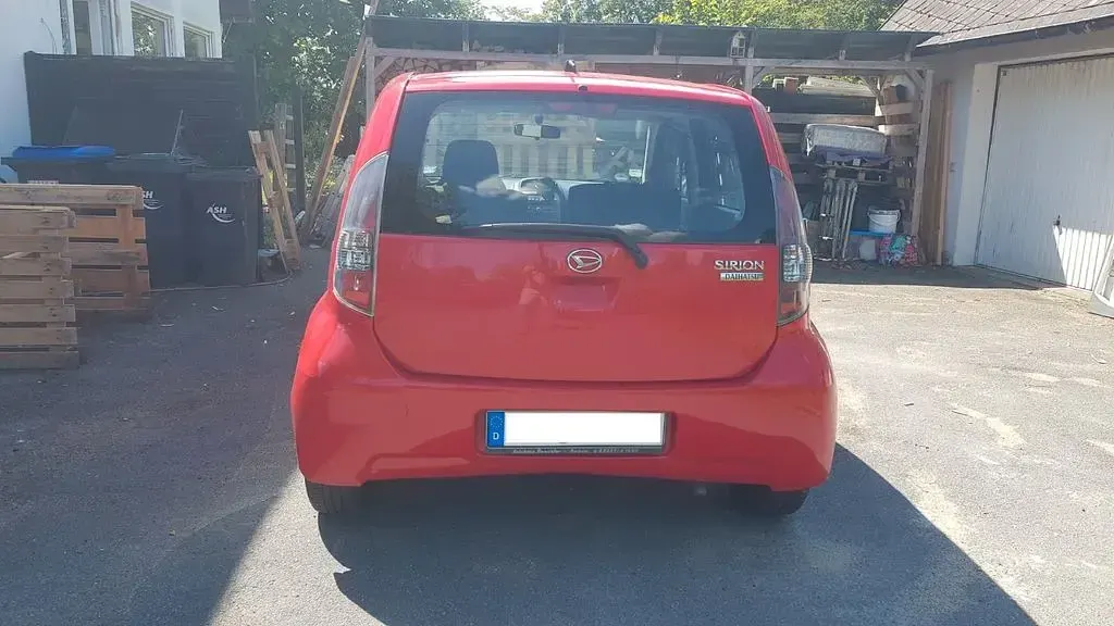Gebraucht Daihatsu Sirion 69 PS (50 kW) 2009 Rot Kleinwagen