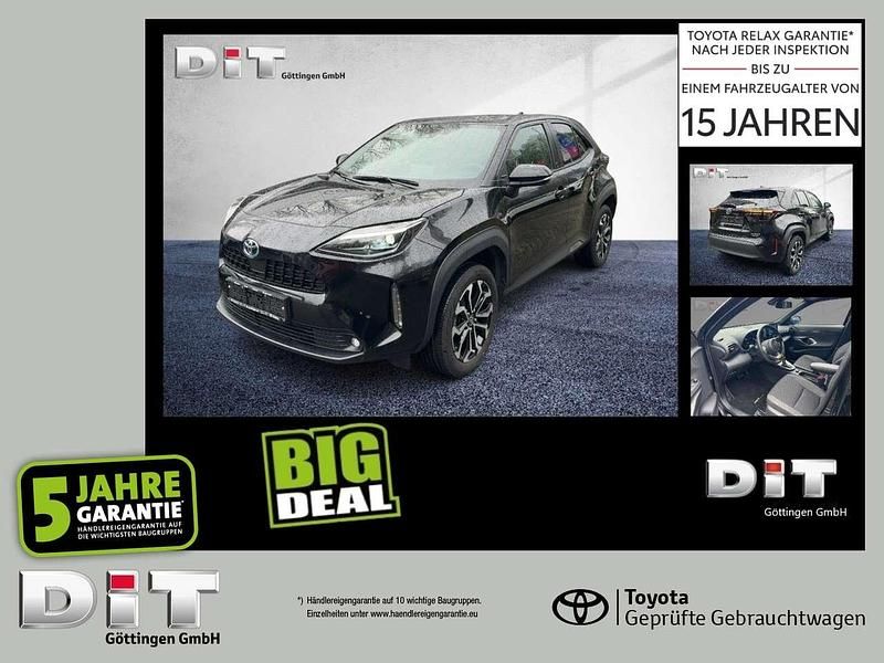 Black mica / ink Gebraucht 2022 Toyota Yaris Hybrid Team SUV | 23.990 € (Fairer Preis) - Bild 1/4