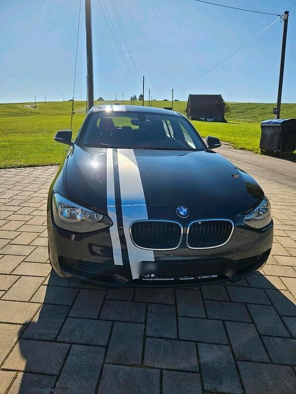 Schwarz Gebraucht 2012 BMW 116 Efficient Dynamics Kleinwagen | 7.000 € - Bild 1/4