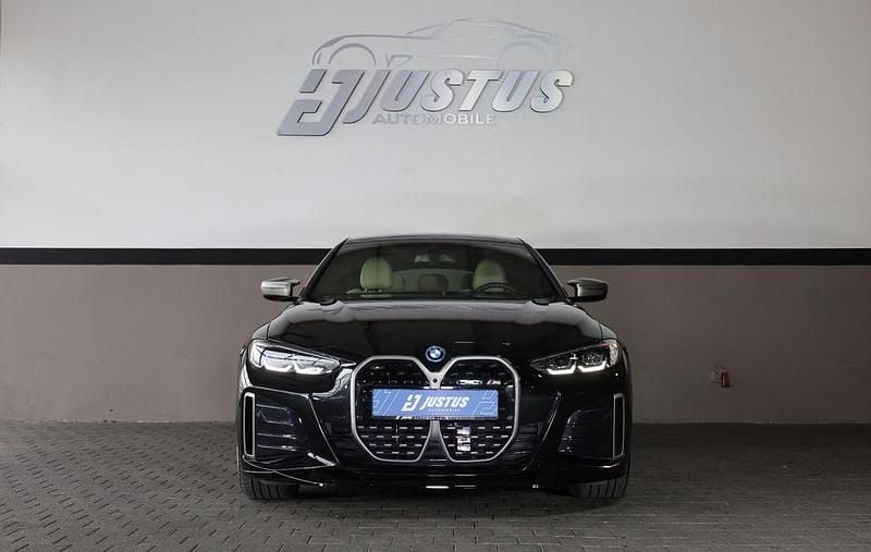 Gebraucht BMW i4 Performance 400 kW (544 PS) 2024 Black sapphire metallic (475) Limousine