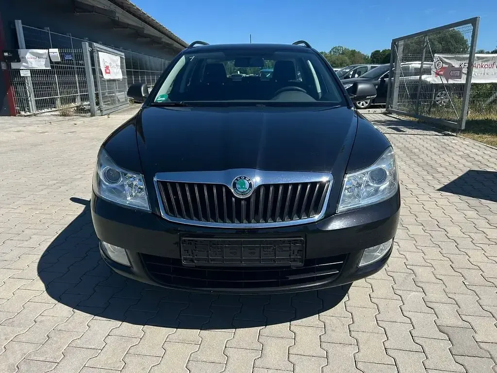 Gebraucht Skoda Octavia Ambition 110 PS (80 kW) 2012 Schwarz Kombi