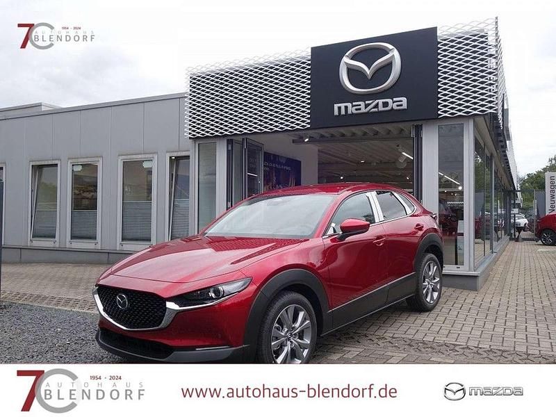 Soul red crystal Gebraucht 2024 Mazda CX-30 Exclusive-Line SUV | 31.890 € - Bild 1/3