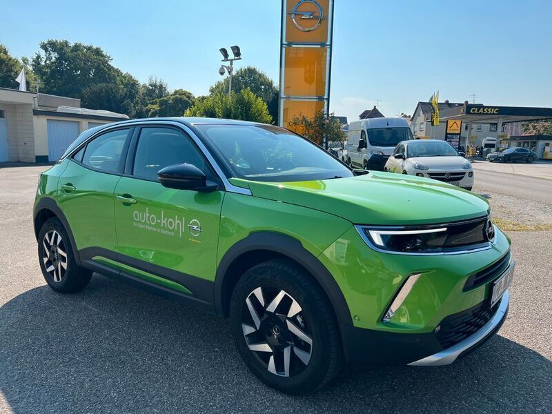 Grün Gebraucht 2023 Opel Mokka Elegance SUV | 21.900 € (Teuer) - Bild 1/4