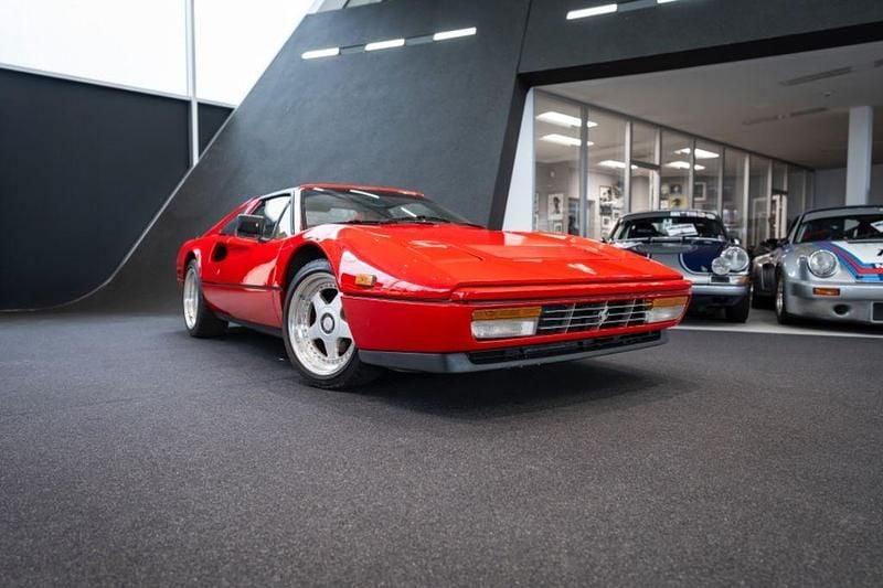 Rosso corsa Gebraucht 1988 Ferrari 328 Cabrio | 69.328 € - Bild 1/4