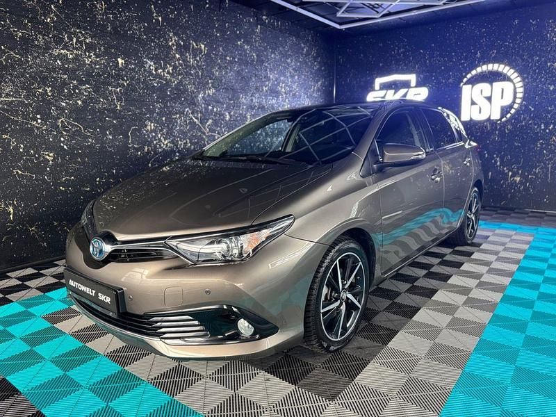 Grau Gebraucht 2017 Toyota Auris Hybrid Edition-S Limousine | 14.499 € (Fairer Preis) - Bild 1/4