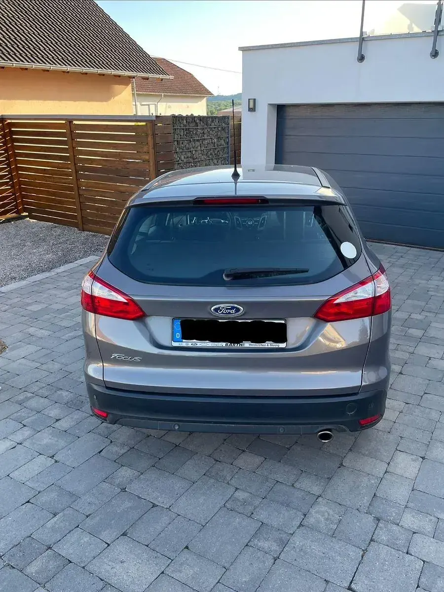 Gebraucht Ford Focus Titanium 116 PS (85 kW) 2014 Braun Kombi
