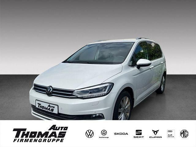 Oryxweiß perlmutteffekt Gebraucht 2024 VW Touran Highline Van / Kleinbus | 35.380 € (Fairer Preis) - Bild 1/3
