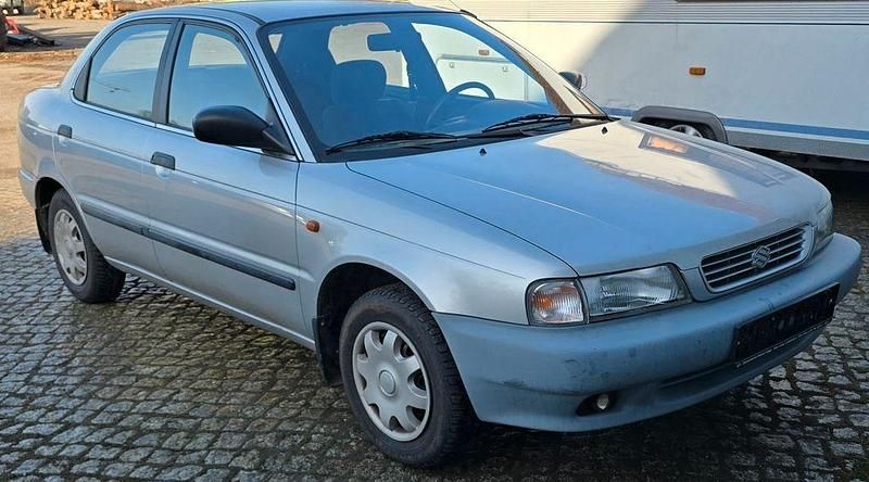 Gebraucht Suzuki Baleno 99 PS (72 kW) 1994 Silber Limousine