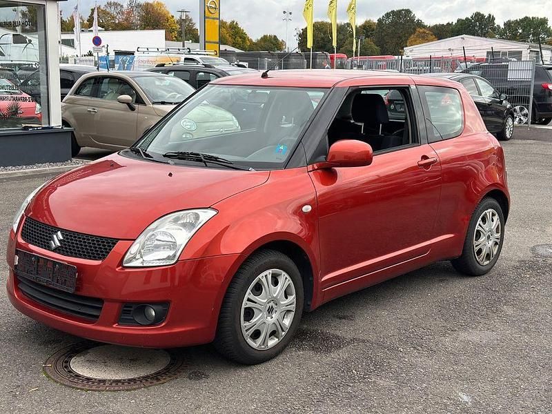Rot Gebraucht 2009 Suzuki Swift Club Kleinwagen | 2.500 € (Fairer Preis) - Bild 1/4